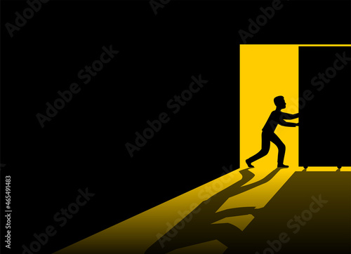 Obraz na plátně Businessman pushing door to open