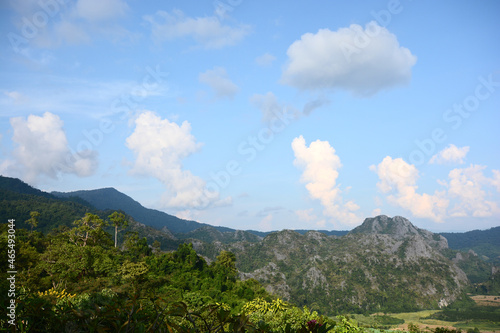 Beautiful background view of mountain and sky with clear sky and white cloud at Phu Langka National Park  Payao Province  Thailand.