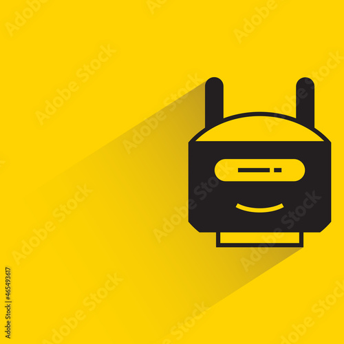 robot character with drop shadow on yellow background
