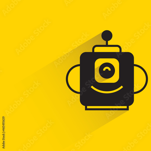 robot character with drop shadow on yellow background