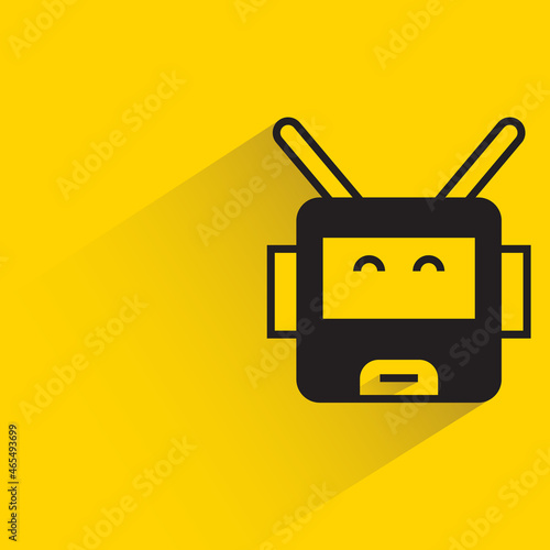 robot character with drop shadow on yellow background