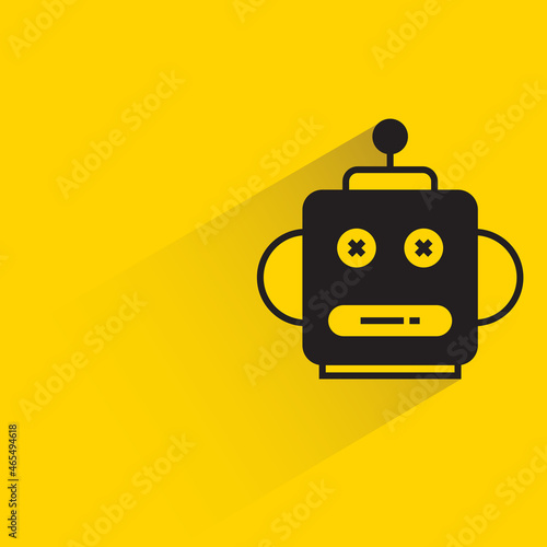 robot head with drop shadow on yellow background