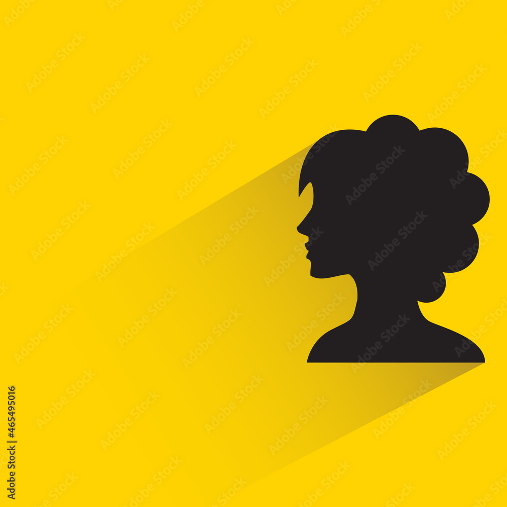 silhouette famale face with drop shadow on yellow background silhouette famale face with drop shadow on yellow background