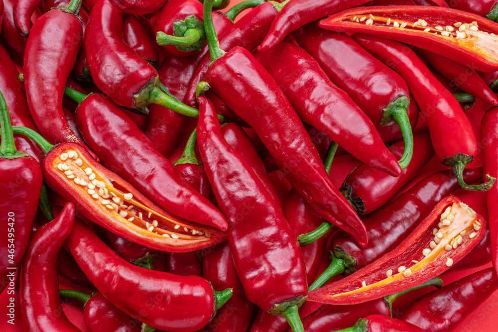 Lot of fresh red chilli peppers. Food background.