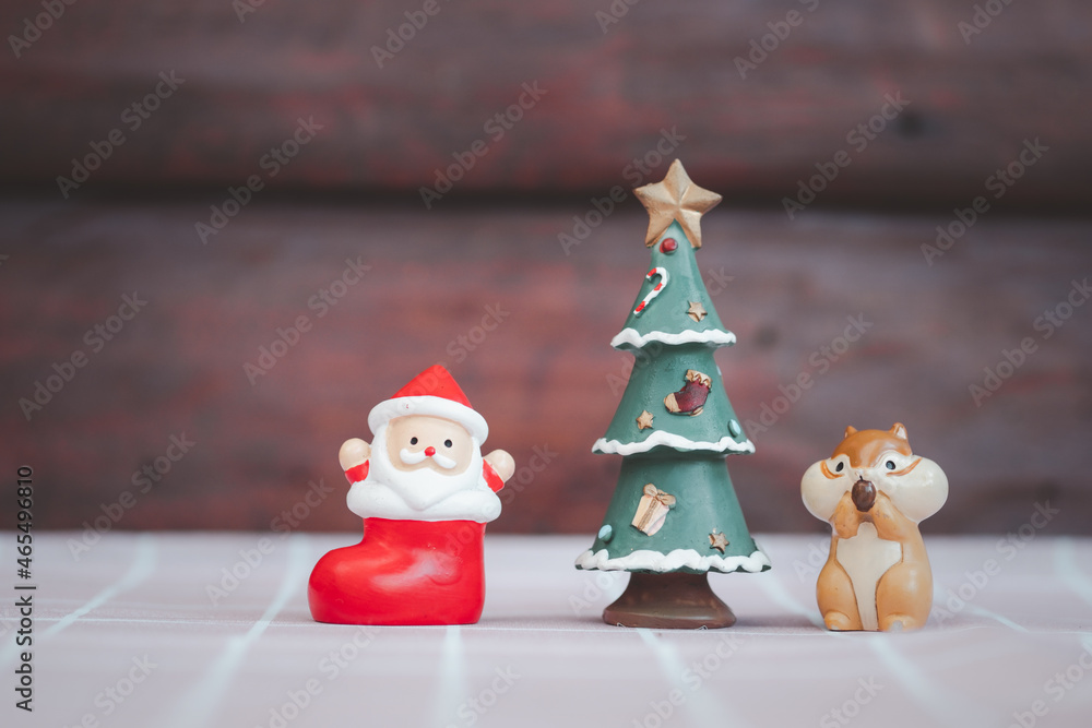 Ceramic doll Santa Claus, Christmas tree and squirrel. Ceramic doll Santa Claus, Christmas tree and squirrel.