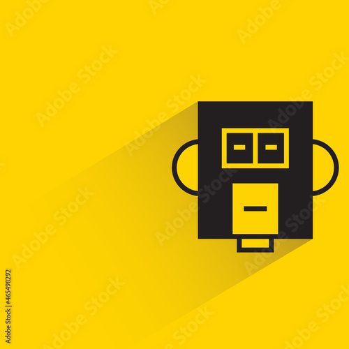 robot character with drop shadow on yellow background