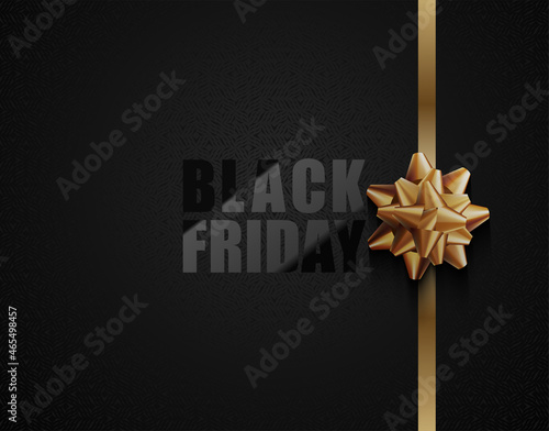 Black Friday vector dark background with golden ribbon bow. Glossy lacquered black text on matt geometric pattern