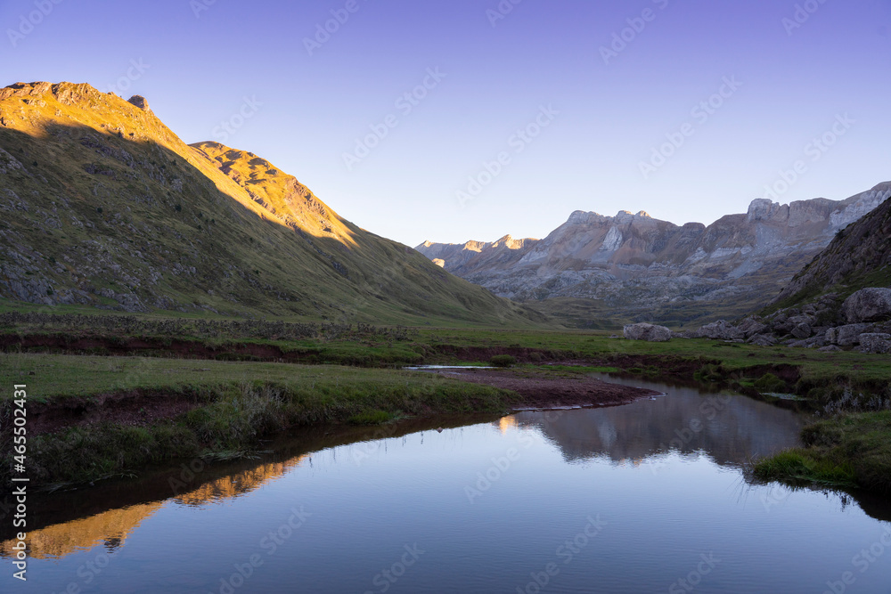 river on a mountain landscape at sunset in the pyrenees