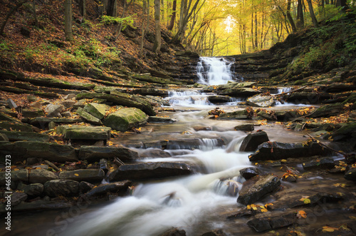 waterfall on a mountain stream in autumn