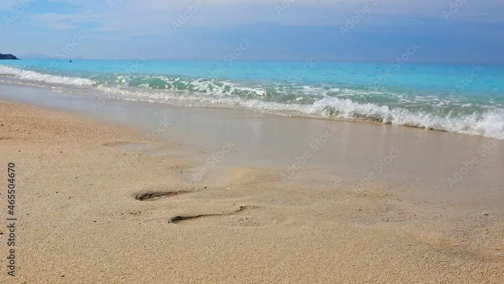 waves at sunny day blue water yellow sand waves at sunny day blue water yellow sand