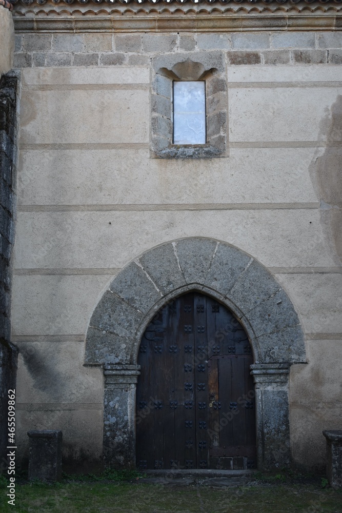  A old door of a medieval church in a town of Cáceres called Granadilla