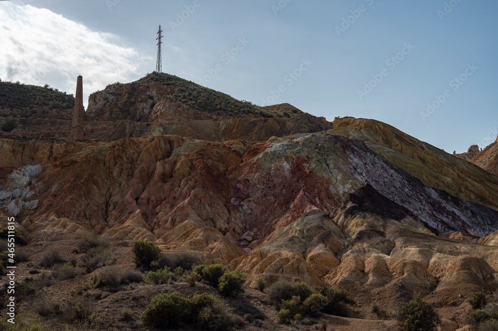 Landscape photography of the mountains of the Mazarron mines, with abandoned power lines and towers