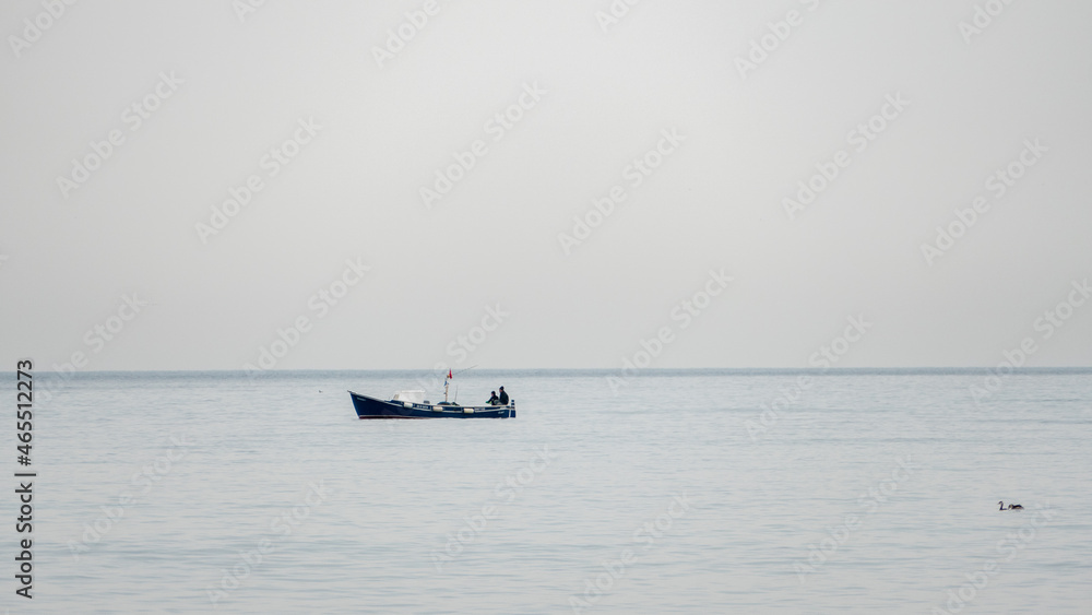 a small boat on the sea, a small fishing boat on the sea, a sea background, a fishing boat wallpaper, fishing in the sea