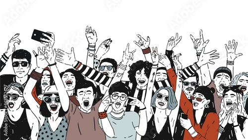 Large group of cheerful people or music fans standing with raised hands loudl...