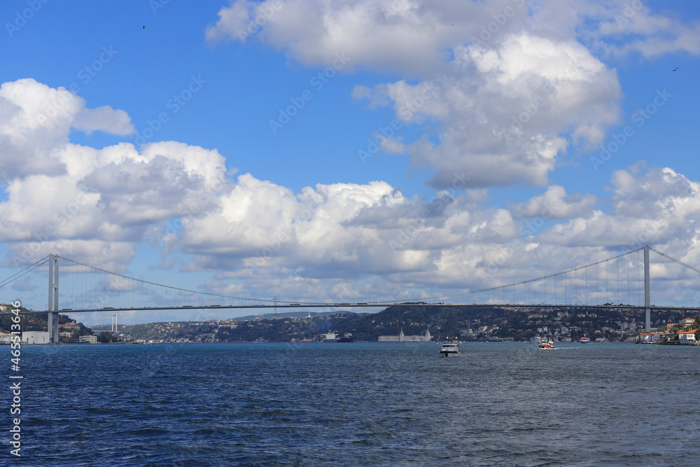 Bosphorus Bridge and cloudy sky background with tower high school Bosphorus Bridge and cloudy sky background with tower high school