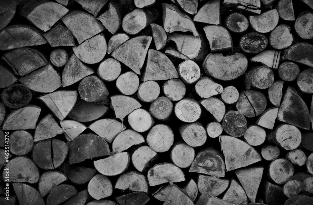 Dry chopped firewood logs ready for winter as background or texture. Dry chopped firewood logs ready for winter as background or texture.