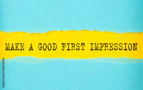 Make a good first impression text on the torn paper , yellow background