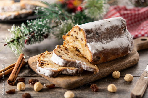 Traditional German Christmas stollen on wooden table