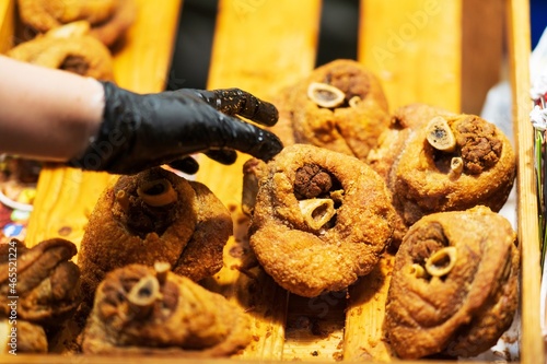 Photography Closeup of Deep Fried Pork Knuckle, thai street food market