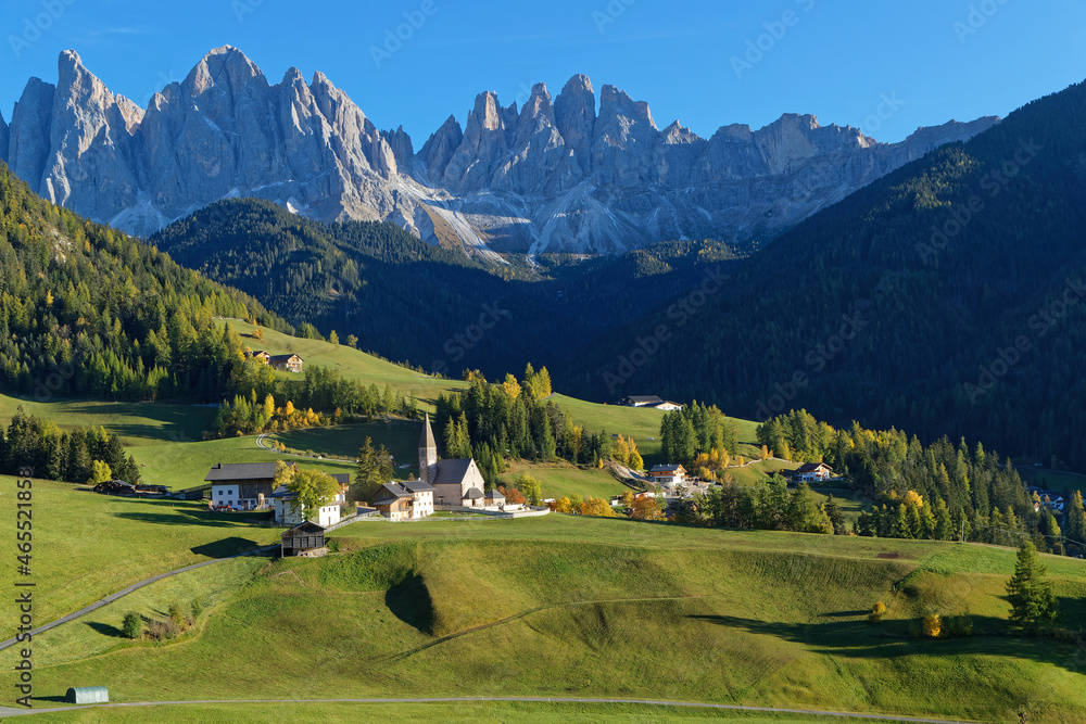 Landscape of Santa Maddalena Alta, Val di Funes, on the italian Dolomites, with fall colors