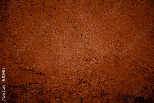fond ou texture abstraite de mur de béton ocre