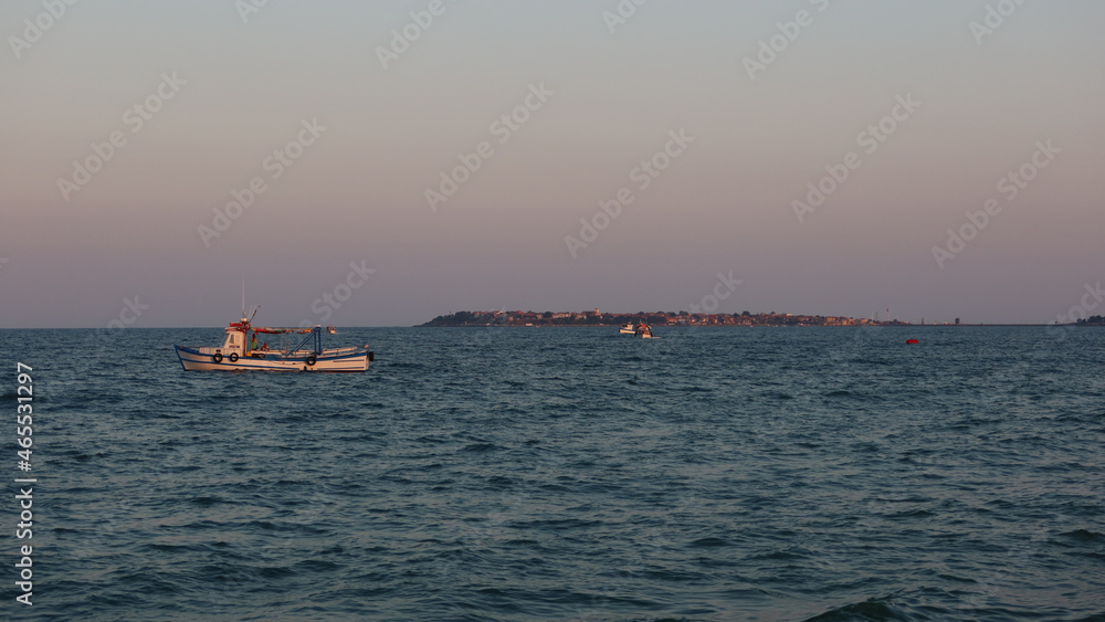 Sunny Beach, Bulgaria. Tourist boat to carry tourists between Sunny Beach resort and the Nesebar city. Sunset time
