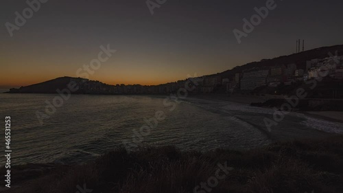 Beach sunrise over Malpica de Bergantiños near the sea