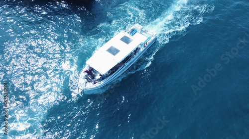 Tenerife. Yachts at the sea surface. Aerial view of luxury floating boat on blue Atlantic. Ocean at sunny day. Travel - image © victorcalomfir