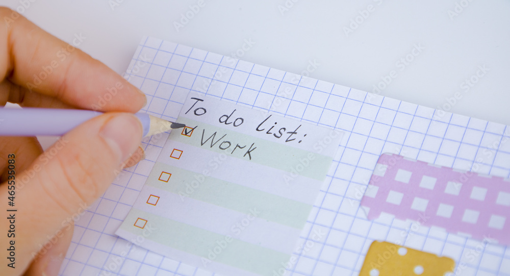 Notepad and pencil on the table. Planning the day. To do list Notepad and pencil on the table. Planning the day. To do list