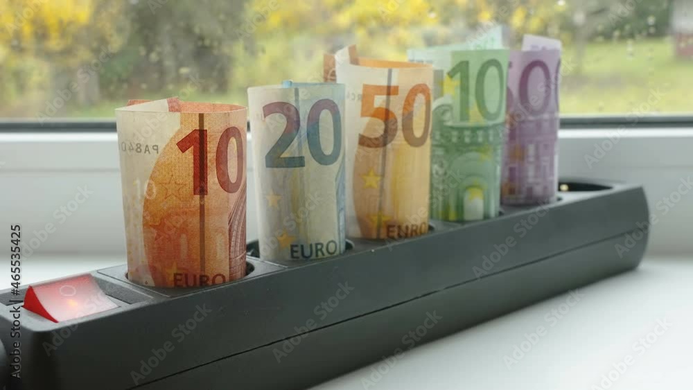 Closer look of the money bills on the socket of the electrical