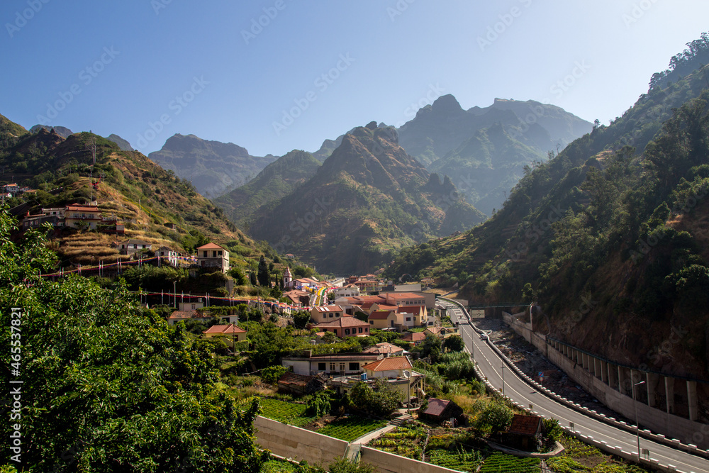 Madeira, Portugal, beautiful view of valley and mountains in the heart of Madeira, road goes through the mountains and village in the valley