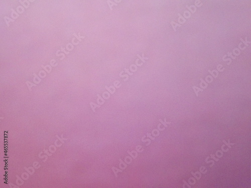 Purple solid color surface of colored paper as a background. High quality photo