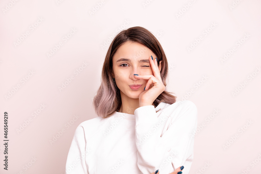 Portrait of a young girl model beautiful and natural with emotions in the studio Portrait of a young girl model beautiful and natural with emotions in the studio
