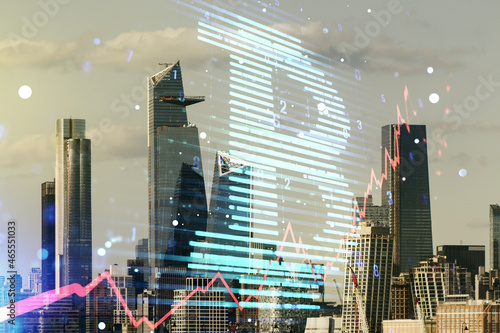 Double exposure of creative Bitcoin symbol hologram on Manhattan office buildings background. Mining and blockchain concept