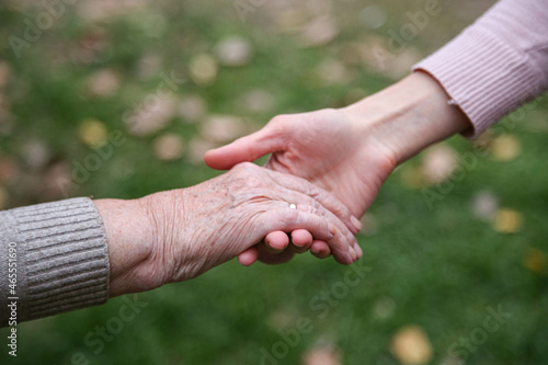 Helping hands. The concept of care for the elderly © Yevhen