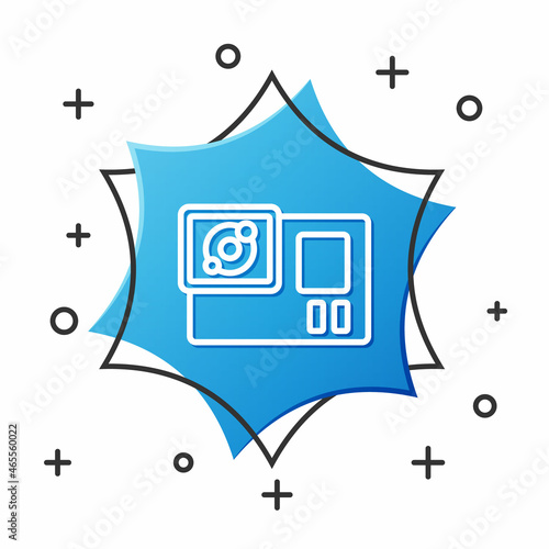White line Action extreme camera icon isolated on white background. Video camera equipment for filming extreme sports. Blue hexagon button. Vector