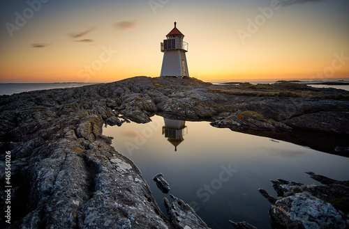Golden sunset with lighthouse, Vigra, Norway