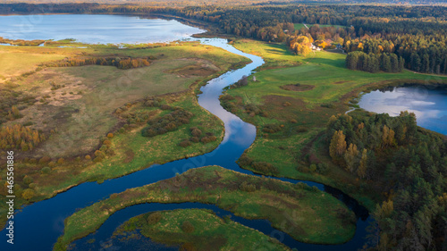 Konstfotografi Beautiful early autumn landscape, field, river, lake and colorful forest