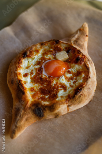 National Caucasian dish Adjarian khachapuri. Georgian cuisine. photo