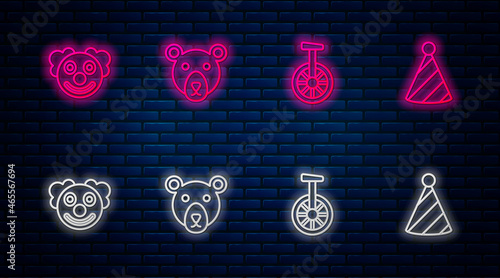 Set line Bear head, Unicycle or one wheel bicycle, Clown and Party hat. Glowing neon icon on brick wall. Vector