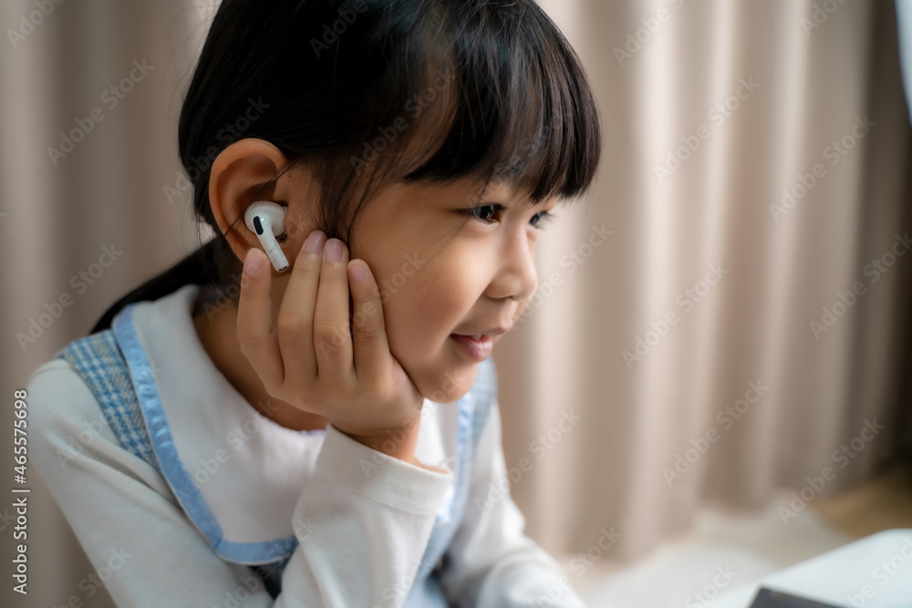 Distance Education,Child use headset with laptop for online education,Back to school. Distance Education,Child use headset with laptop for online education,Back to school.