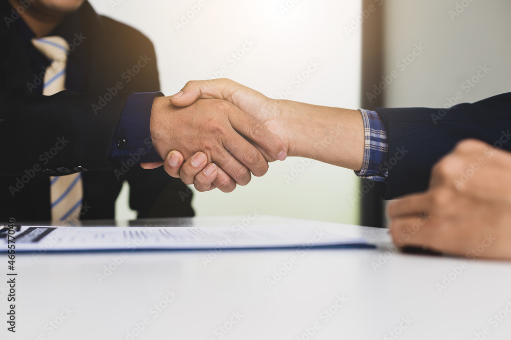 Handshake. Business people shake hands to make an agreement.