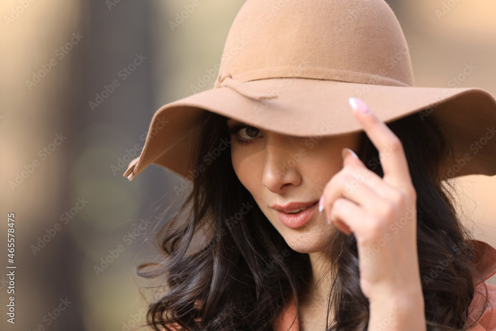 autumn portrait of a beautiful asian brunette woman in a fashionable hat autumn portrait of a beautiful asian brunette woman in a fashionable hat