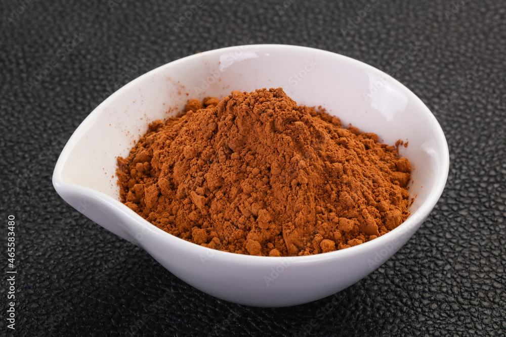 Cocoa powder in the bowl Cocoa powder in the bowl
