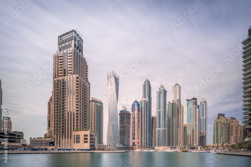 Day view of Dubai Marina bay with cloudy sky, UAE © boule1301