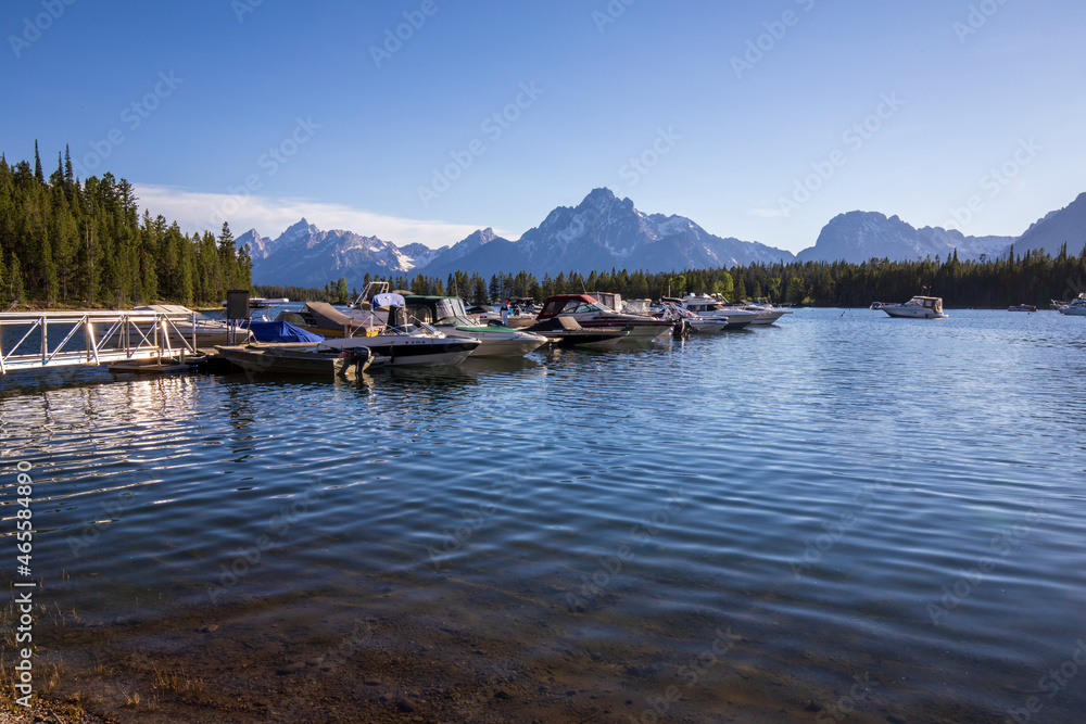 Fototapeta premium Colter Bay, Wyoming, USA - June 17 2021: Jackson Lake Overlook in Grand Teton National Park during summer Wyoming. Ranger Peak and Mount Moran.