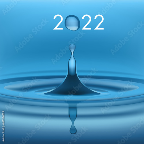 Carte de voeux écologique avec une goutte d’eau en suspension, symbole de pureté, qui forme le zéro de l’année 2022.