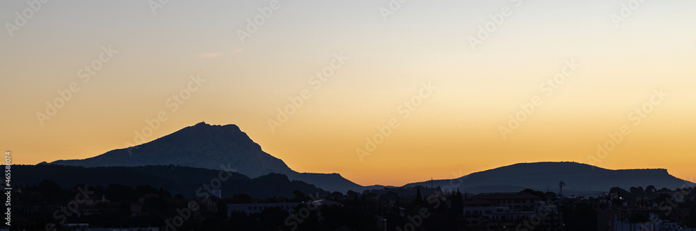 Sainte Victoire mountain in the light of the rising sun in autumn