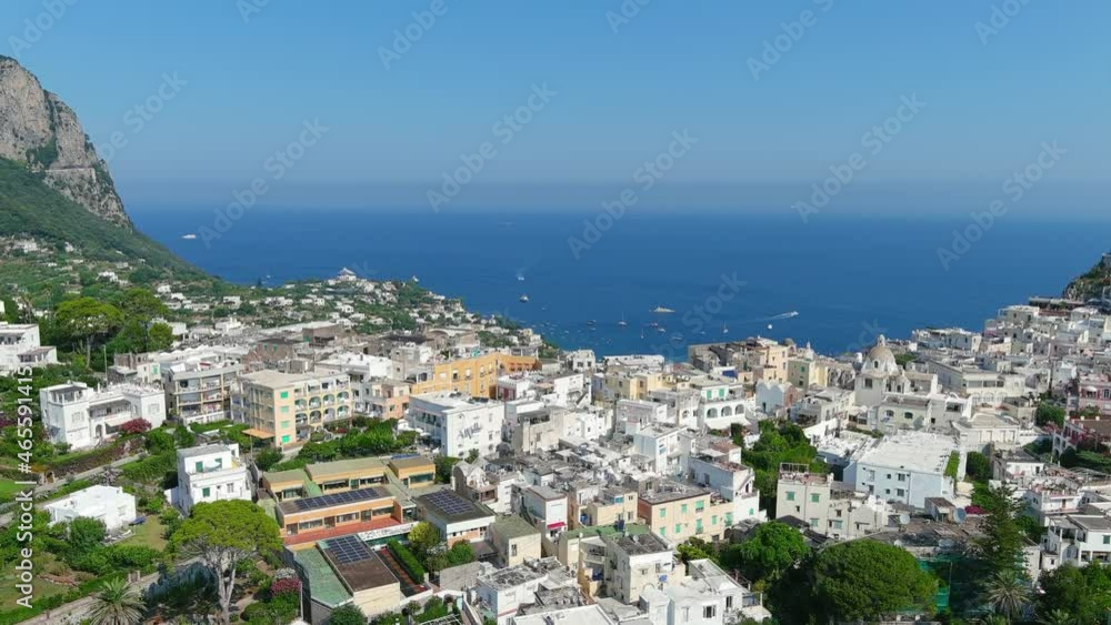 Capri, Italy: Aerial view of famous Italian island near Naples, north region Marina Grande, lot of boats and yachts around Porto Turistico di Capri - landscape panorama of Europe from above Capri, Italy: Aerial view of famous Italian island near Naples, north region Marina Grande, lot of boats and yachts around Porto Turistico di Capri - landscape panorama of Europe from above