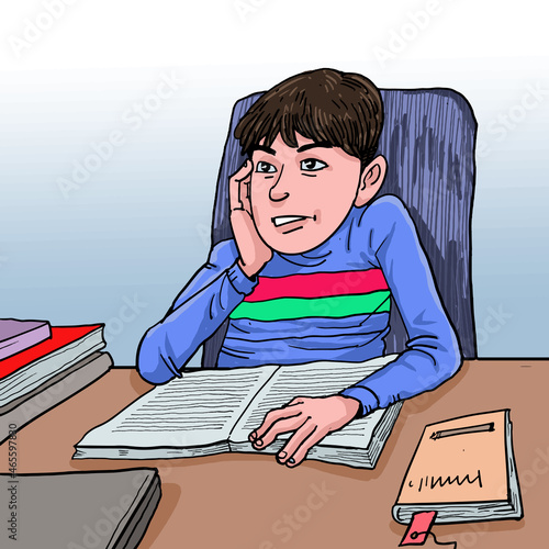 A schoolboy studies and thinks something.